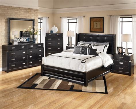 This queen upholstered bed is sure to awaken a love for modern platform styling with a softer side. . Ashley stewart furniture